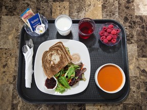 A typical meal at the Queensway Carleton Hospital, which consists of a Shaved Roast Turkey on Panini Bread sandwich, a European Lettuce salad, Campbell's Tomato Soup, fresh raspberries, cranberry juice and one percent milk.   Wayne Cuddington/ Postmedia
