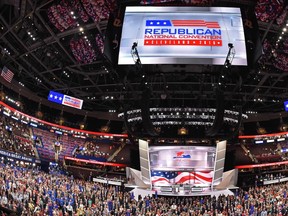 Delegates pose for an official convention photograph on the opening day of the Republican National Convention at the Quicken Loans arena in Cleveland, Ohio on July 18, 2016.
AFP PHOTO / Robyn BECKROBYN BECK/AFP/Getty Images