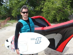 Kiteboarder Mark Bowser, 40, pulled a struggling swimmer to safety at a Wainfleet beach on Monday July 18, 2016. (Allan Benner/Welland Tribune)