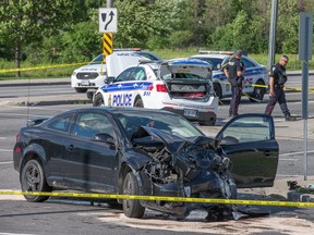 An Ottawa police officer in her 30s had to be extricated from her cruiser after it was involved in a collision at the intersection of Conroy and Walkley roads on Monday afternoon. Wayne Cuddington