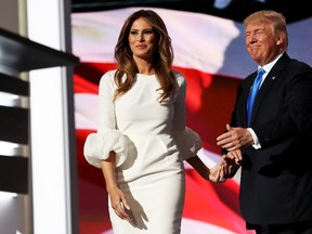 Presumptive Republican presidential nominee Donald Trump introduces his wife Melania on the first day of the Republican National Convention on July 18, 2016 at the Quicken Loans Arena in Cleveland, Ohio. An estimated 50,000 people are expected in Cleveland, including hundreds of protesters and members of the media. The four-day Republican National Convention kicks off on July 18.  (Photo by Joe Raedle/Getty Images)