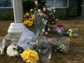 A memorial for fallen firefighter Patrick Pedgeon has been set up outside the Loyalist Fire Department in Amherstview. He died Saturday night after responding to a fire in an apartment building not far from the station. Steph Crosier The Whig-Standard