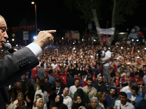 Turkey's President Recep Tayyip Erdogan addresses his supporters gathered in front of his residence in Istanbul, early Tuesday, July 19, 2016. (Kayhan Ozer/Pool Photo via AP)