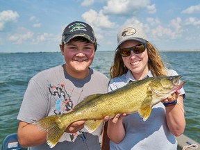 Ben Matity and columnist Ashley Rae with her 27-inch walleye caught, and released, on Last Mountain Lake, about 40 km northwest of Regina.
(Supplied photo)