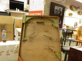 A 1950s-era Munro wooden tabletop hockey game will go up for bids Thursday night at Kaye's Auction House. (HANDOUT PHOTO)