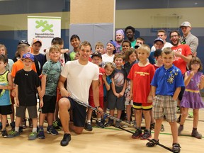 Taylor Hall (centre) stopped by the Boys and Girls Club in Kingston on July 18, 2016 to meet some of his young fans and promote the Taylor Hall Charity Ball Hockey Tournament taking place on Saturday July 23. (Jane Willsie/For The Whig-Standard)
