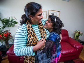 Birra Alyas, 11, and her mother Shazia Dawood at their home in Mississauga on Tuesday July 19, 2016. (Ernest Doroszuk/Toronto Sun)