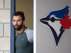 Jose Bautista of the Toronto Blue Jays peers out from the clubhouse door at spring training in Dunedin, Fla. on Feb. 24, 2016. (FRANK GUNN/The Canadian Press files)