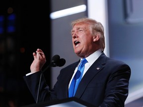 Republican presidential candidate Donald Trump speaks as he introduces his wife Melania Trump during the first day of the Republican National Convention in Cleveland, Monday, July 18, 2016. (AP Photo/Carolyn Kaster)