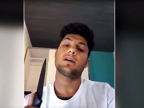 This still image taken from an undated video posted on The Aamaq news agency, which is affiliated to the Islamic State group, purports to show a 17-year-old Afghan asylum-seeker who attacked people with an axe and knife on a train in southern Germany, making a statement in Pashto while brandishing a knife. The young man calls on others to "kill these infidels in the countries that you live in." The Islamic State group claimed responsibility for the Monday night train attack. (Militant video via AP)