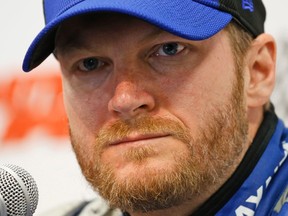 Sprint Cup driver Dale Earnhardt Jr., speaks to the media during a press conference at the Martinsville Speedway in Martinsville, Va. (AP Photo/Steve Helber, File)