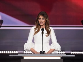 This file photo taken on July 18, 2016 shows Melania Trump, wife of Republican presidential candidate Donald Trump, as she addresses delegates on the first day of the Republican National Convention at Quicken Loans Arena in Cleveland, Ohio.
A Trump staffer apologized July 20, 2016 for using remarks by Michelle Obama in a speech delivered by Melania Trump at the Republican National Convention that ignited a deeply embarrassing plagiarism row. The speech from the ex-model, watched by millions on television on Monday night, amounted to a nightmarish start for the convention and subjected her husband's presidential campaign to withering scrutiny.
 / AFP PHOTO / Robyn BECKROBYN BECK/AFP/Getty Images