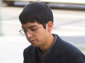 Stephen Arthuro Solis-Reyes enters court before a hearing in London, Ont. on Wednesday July 20, 2016. 
Solis-Reyes is seeking a one-week variance in his conditional sentence for his work exposing the weaknesses of the CRA website by using the heartbleed virus.
Mike Hensen/The London Free Press/Postmedia Network
