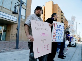 Intelligencer file photo
Allan Nickerson shows his support for Peer Support South East Ontario (PSSEO), in downtown Belleville, during an information picket held in April. Staff there say they are struggling with low wages and limited working hours and SEIU Healthcare is now supporting that battle.