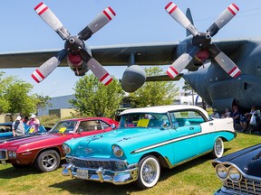 Intelligencer file photo
Vintage cars and historic planes shared the grounds at National Air Force Museum grounds for the Wings and Wheels Classic Car Show last year. The event returns to the site this weekend.