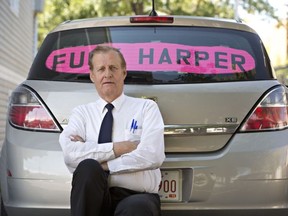 Rob Wells with his Stephen Harper sign.