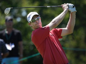 David Hearn swings from the tee during second round action at the RBC Canadian Open at Glen Abbey Golf Course in 2015. (Craig Robertson/Toronto Sun/Files)