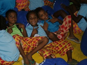 Boys with their bedkits.