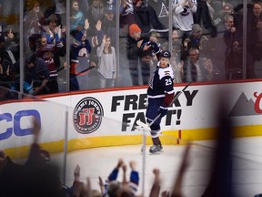 Colorado Avalanche center Mikhail Grigorenko celebrates his goal in the first period against the Winnipeg Jets at the Pepsi Center in Denver on Feb. 6, 2016. (Ron Chenoy/USA TODAY Sports)