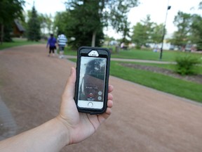 Bradley Smith shows the view of Central Park through his Pokémon Go app.