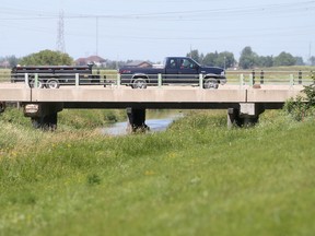Traffic over a rural bridge, north of Winnipeg. (CHRIS PROCAYLO/WINNIPEG SUN)