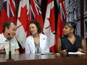 Activists called for an end to indefinite detention of immigration detainees on Thursday, July 21, 2016, in Toronto. They are, from left, immigration consultant MacDonald Scott, Dr. Michelle Fraser, and Tracey Mann, with End Immigration Detention Network. THE CANADIAN PRESS/Colin Perkel