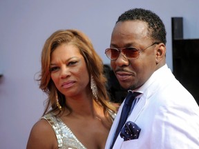 In this June 30, 2013 file photo, Alicia Etheredge, left, and Bobby Brown arrive at the BET Awards in Los Angeles. (Photo by Chris Pizzello/Invision/AP, File)