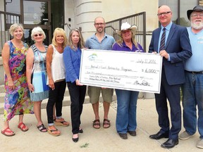 Representatives of local festivals in Elgin county which received grants last week under the Festival and Event Partnership program are, from left - Marcia Pensa, Sharron Russell, Kim Yuhasz, Penny Crichton - Off the Wall, Off the Vine Art Show; Will Faughnan - HarbourFest; Theresa Vandevenne - Cactus, Cattle and Cowboys; Alan Smith - Elgin County Economic Development; Eric Curtis - Strawberry Fields Kite Festival.