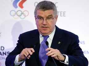 In this Wednesday, Oct. 21, 2015 file photo, International Olympic Committee (IOC) president Thomas Bach speaks at the World Olympians Forum in Moscow, Russia. (AP Photo/Alexander Zemlianichenko, Pool, File)