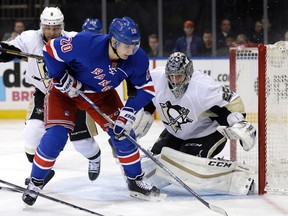 The Rangers signed forward Chris Kreider to a four-year contract worth $18.5 million to avoid arbitration. (Seth Wenig/AP Photo/Files)