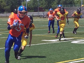 Sarnia Sturgeons bantam running back Dylan Hiltz charges up the field against the Guelph Jr. Regals on July 10 at Norm Perry Park. Sarnia's bantam squad concludes its regular season Sunday at 2 p.m. at Norm Perry against Chatham-Kent. Handout/Sarnia Observer/Postmedia Network