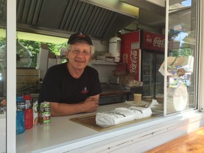 Sammy Cardabikis was manning our of his souvlaki stands at the Home County Folk Festival Sunday. It's almost a year since he was attacked by four masked intruders and severely beaten at his home base on Trafalgar Street. The case is still open and no arrests have been made. (JANE SIMS, The London Free Press)