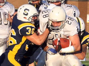 Sudbury Spartans running back Josh Cuomo (28) runs the ball against the Sault Steelers during Northern Football Conference action in this file photo. Ben Leeson/The Sudbury Star/Postmedia Network