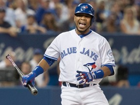 Toronto Blue Jays' Edwin Encarnacion reacts to a called strike from Seattle Mariners starting pitcher James Paxton during the sixth inning of a game at Rogers Centre in Toronto on July 22, 2016. (THE CANADIAN PRESS/Fred Thornhill)