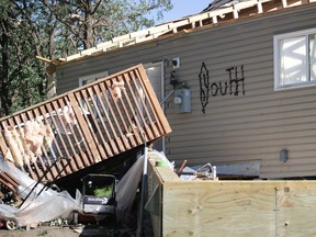 A home was knocked off its foundation and witnesses reported it took a direct hit from the tornado that ripped through Long Plain First Nation, southwest of Portage la Prairie, Man., Wednesday, July 20, 2016. (PHOTOS BY MATT HERMIZ AND BRIAN OLIVER/THEGRAPHIC/POSTMEDIA NETWORK)