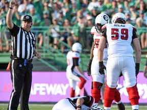 Ottawa Redblacks quarterback Trevor Harris lies injured on the field during a CFL action against the Saskatchewan Roughriders at Mosaic Stadium in Regina on July 22, 2016. (DON HEALY/Regina Leader-Post)