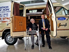 Postmedia file photo
Terry Fox's brother Darrell Fox and Lou Fine, former district manager of Northern Ontario Cancer Society, sit in a 1980 Ford Econoline on May 22, 2008, at Ford Canada. They were together for the unveiling of Terry Fox's 1980 Ford Econoline van used during his 2,146-mile marathon of hope across Canada in 1980. Fine, of Sudbury, died last week.