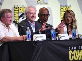 William Shatner, from left, Brent Spiner, Michael Dorn, and Jeri Ryan attend the "Star Trek" panel on day 3 of Comic-Con International on Saturday, July 23, 2016, in San Diego. (Photo by Chris Pizzello/Invision/AP)