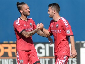 Fury FC midfielder James Bailey (left) congratulates Thomas Stewart after his goal in Jacksonville. (Jacksonville Armada FC)