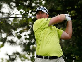 Steve Wheatcroft watches his drive on the 16th hole during the first round of the RBC Canadian Open at Glen Abbey Golf Club in Oakville, Ont., on July 21, 2016. (Gregory Shamus/Getty Images)