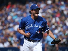 Jason Grilli of the Toronto Blue Jays reacts after getting the last out of the eighth inning during a game action against the Cleveland Indians on July 2, 2016. (TOM SZCZERBOWSKI/Getty Images files)