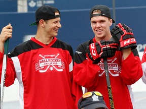 Edmonton Oiler Connor McDavid chats with Dallas Star Jason Spezza at the start of the Rogers Cup ball hockey challenge where tennis and hockey players faced off in Toronto on July 24, 2016. (Michael Peake/Toronto Sun/Postmedia Network)