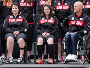 Marie-Ève Croteau, left, is seen during Cycling Canada and Canadian Paralympic Committee's roster selection announcement for the Paralympic Games on June 29, 2016. (Errol McGihon/Postmedia)