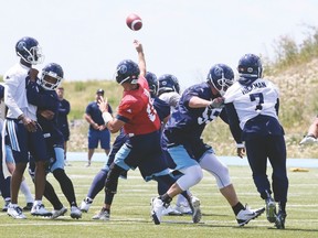 Argonauts QB Ricky Ray unloads a pass during Saturday’s practice at Downsview Park. The offence has been inconsistent through four games and gives the Als a great chance to win tonight if they continue to struggle with possession of the ball. (VERONICA HENRI, Toronto Sun)