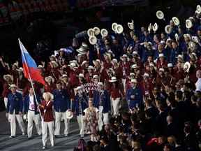 The Russian team takes part in the Opening Ceremony at the 2012 Summer Olympics in London. (AP Photo)