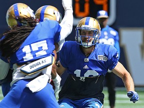 Winnipeg Blue Bombers DB Taylor Loffler closes on the ball during practice at Investors Group Field in Winnipeg on Sun., July 23, 2016. Kevin King/Winnipeg Sun/Postmedia Network