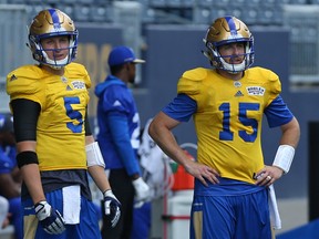 Winnipeg Blue Bombers QBs Drew Willy (left) and Matt Nichols practice at Investors Group Field in Winnipeg on Sun., July 23, 2016. Kevin King/Winnipeg Sun/Postmedia Network