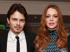 Actress Lindsay Lohan and Egor Tarabasov arrive at the 2016 British Asian Awards at a central London hotel, Friday, April 8, 2016.