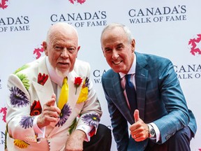 Don Cherry and Ron MacLean at the unveiling of their star on Canada's Walk of Fame on King St. W. in Toronto Monday, July 25, 2016. (Dave Thomas/Toronto Sun)