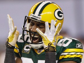 In this Feb. 6, 2011, file photo, Green Bay Packers' Greg Jennings reacts after catching a pass during the second half of Super Bowl XLV against the Pittsburgh Steelers, in Arlington, Texas. (AP Photo/David J. Phillip, File)